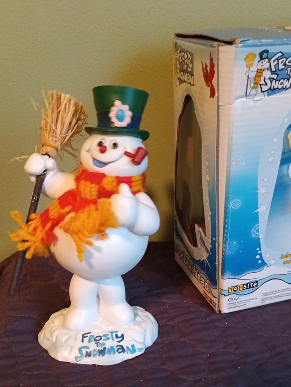 Frosty the Snowman Bobble Figurine with Green Top Hat and Yellow-Orange Scarf